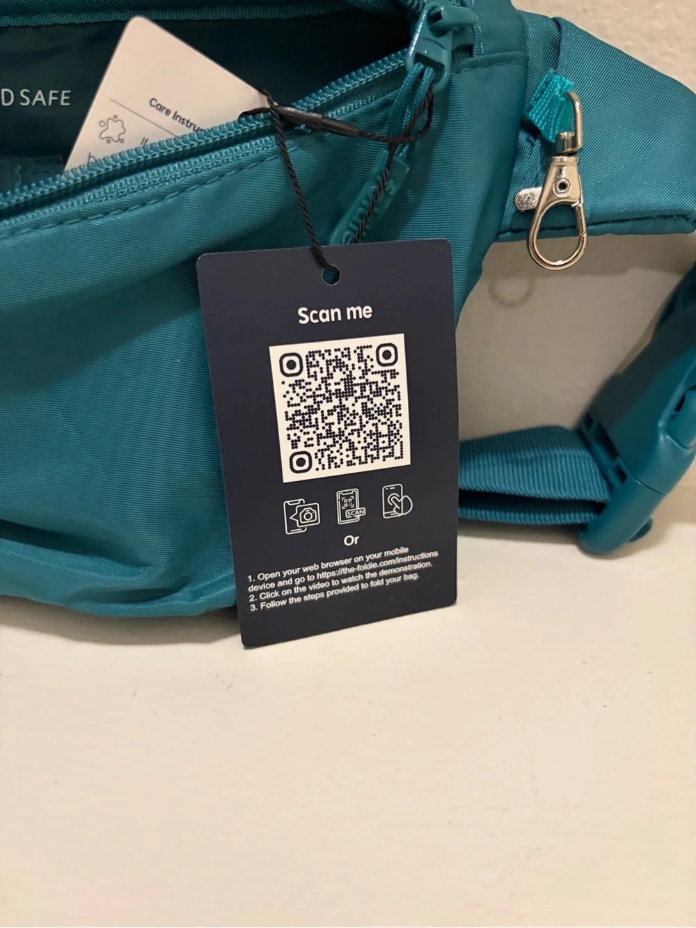 The Foldie Teal Waist Crossbody Bag RFID Blocking Travel Hand Free NWT